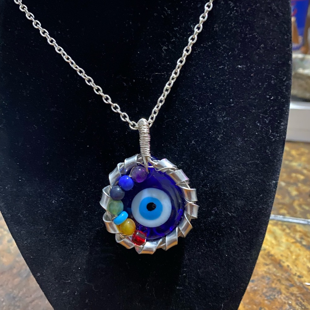 SOLD. Silver 7 Chakra with the Evil Eye in center Necklace